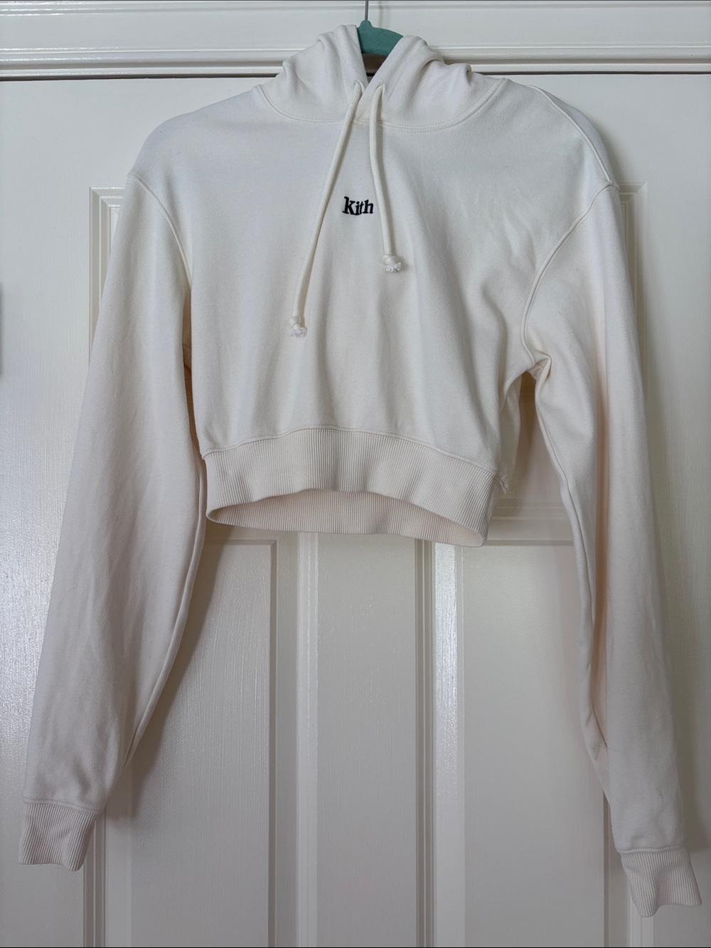 Kith Cropped Hoodie in Cream with Black Logo